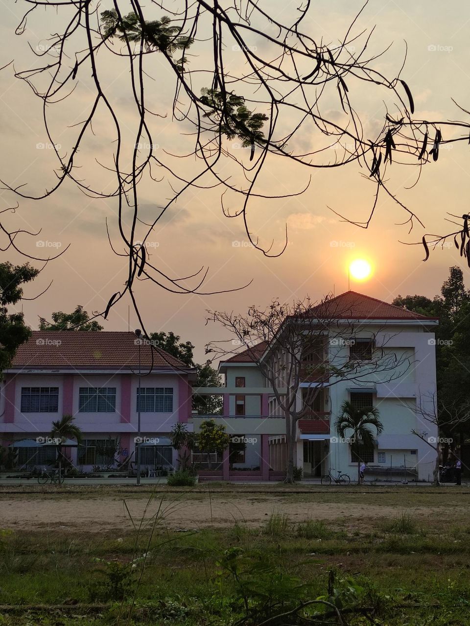 Sunset creates a beautiful picture in a corner of middle school