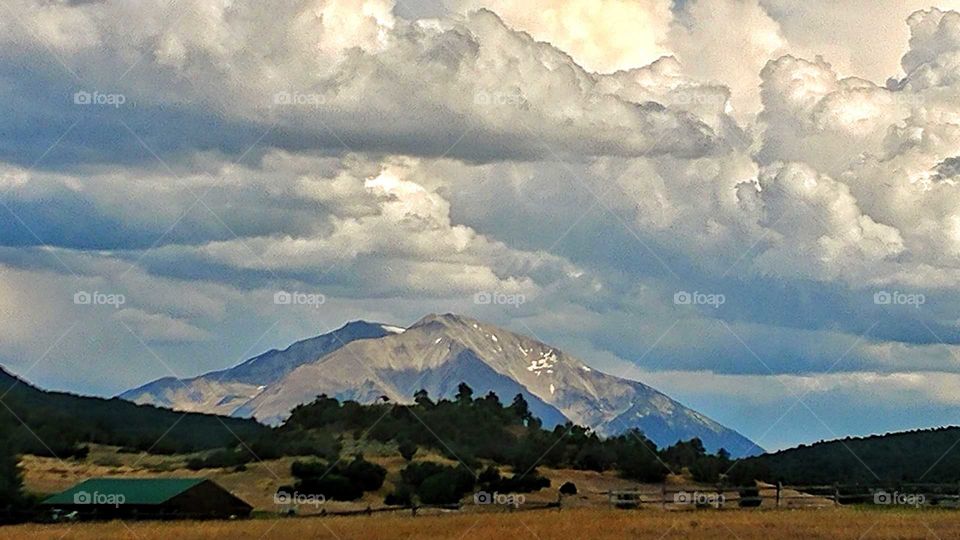 Magnificent clouds rise high over Mt. Sopris on a beautiful western Colrado evening,
.