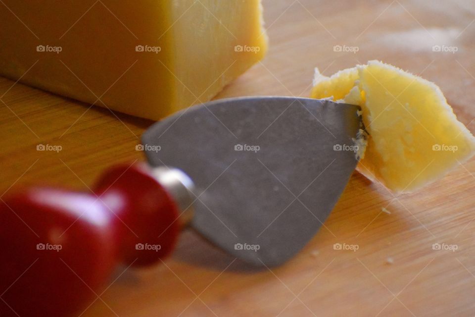 knife for cheese and cheese