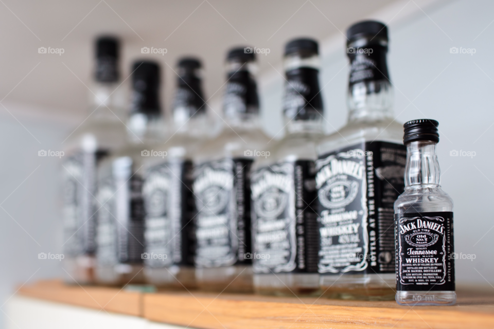 alcohol empty bottles shelf by comonline