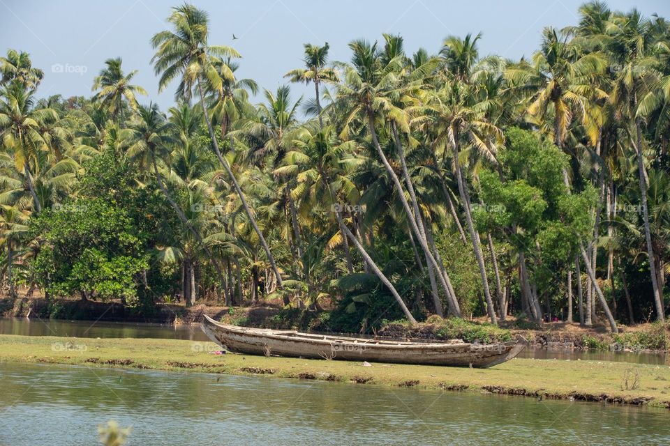 boat beside a lake.