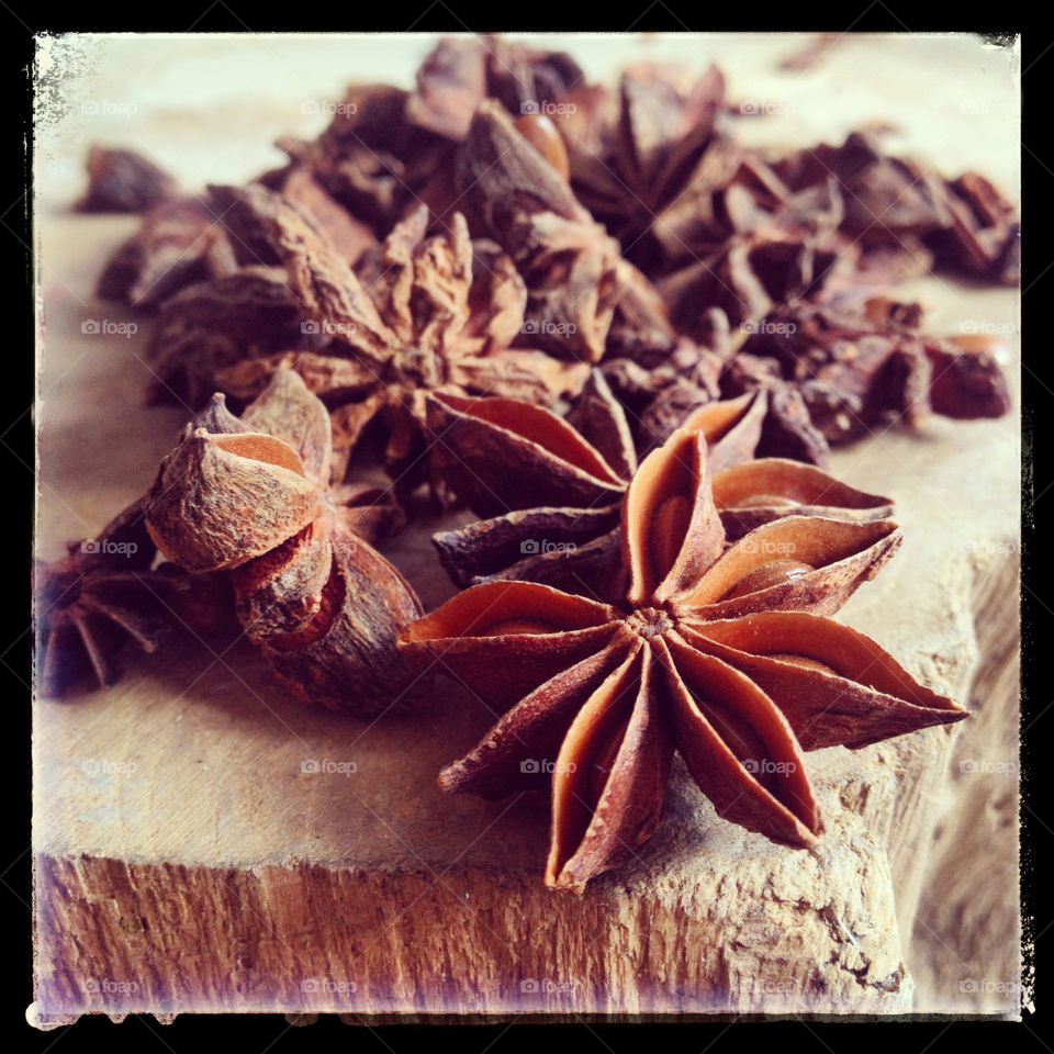 Star anise on a wooden block