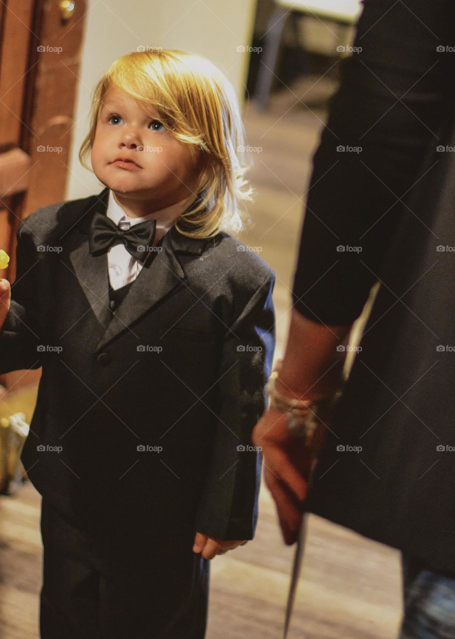 Curious of the wedding ceremonies. Such an innocent child!
