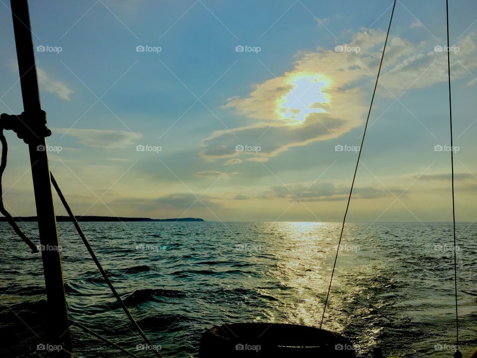 The ocean in the late afternoon along the journey from Newtown Creek by Long Island City, Queens, NY to Liverty Landing in New Jersey passing by the Statue of Liberty. We took this trip several times on our sailboat, the „Salvation“. Summer 2018