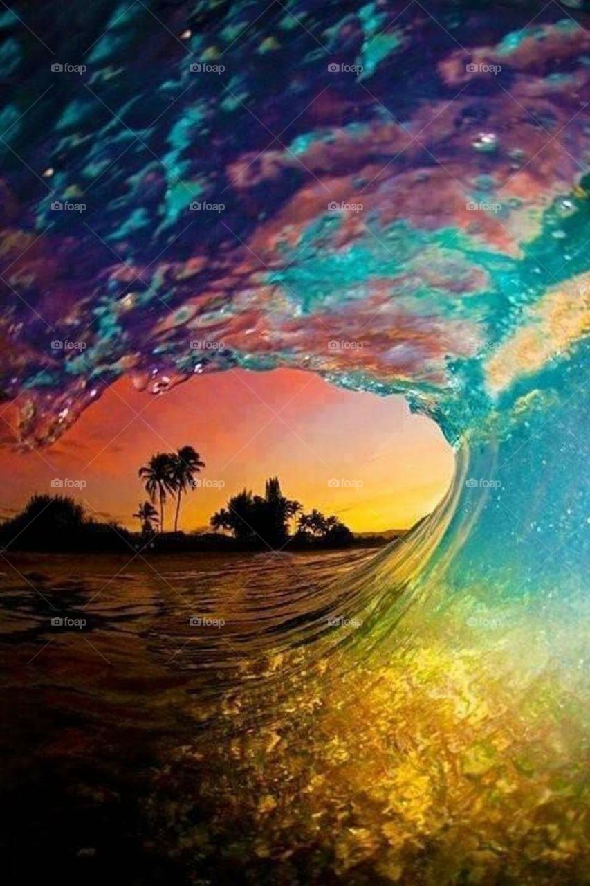 Beautiful colourful wave during a sunset 