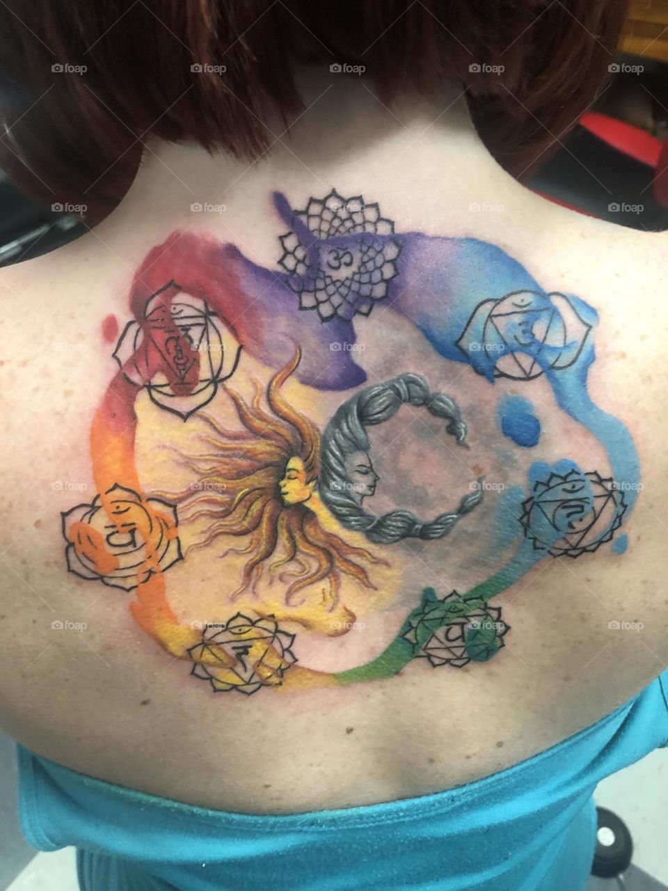 Sun, Moon, Chakras, the opposites of life and the balancing act of the chakras creating balance and harmony, the moon, the divine feminine and the sun the divine masculine. 