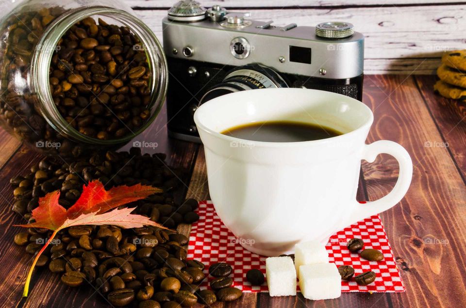 coffee been still life on wooden background