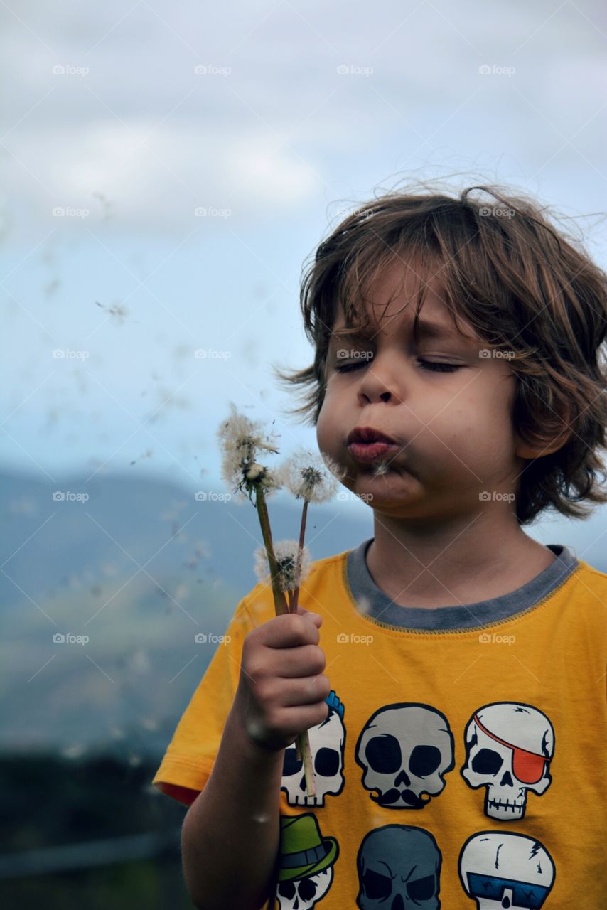 Flying in the Wind. My son enjoying the magic of Mother Nature on a mountain in Puerto Rico.