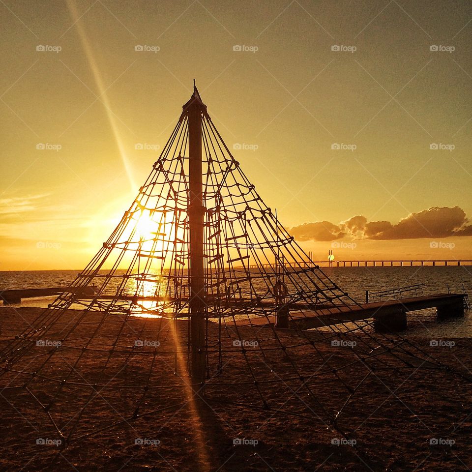 Climbing net in sunset