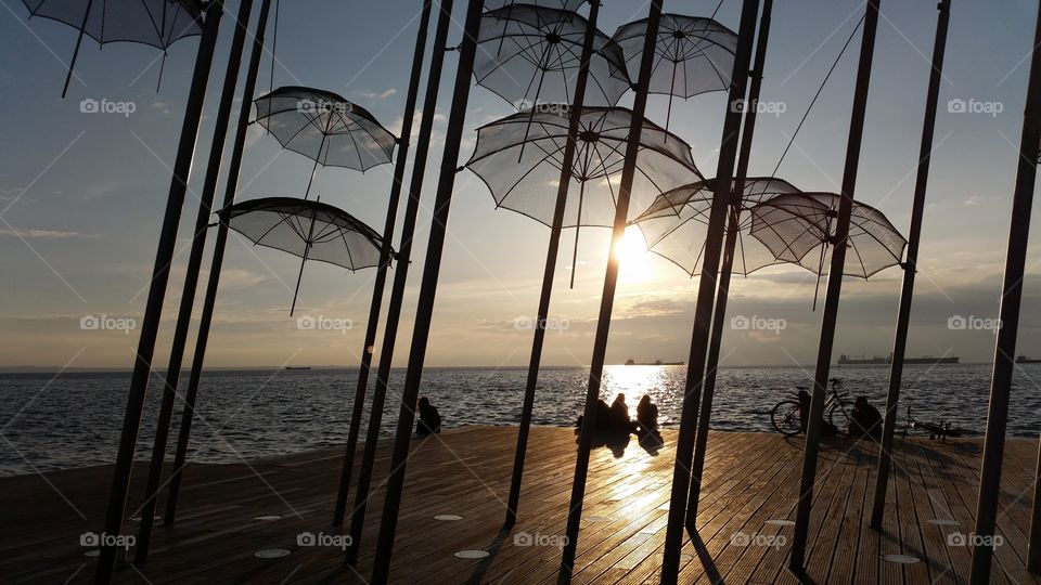 romantic gazing at the sunset. Thessaloniki Greece new waterfront sundown