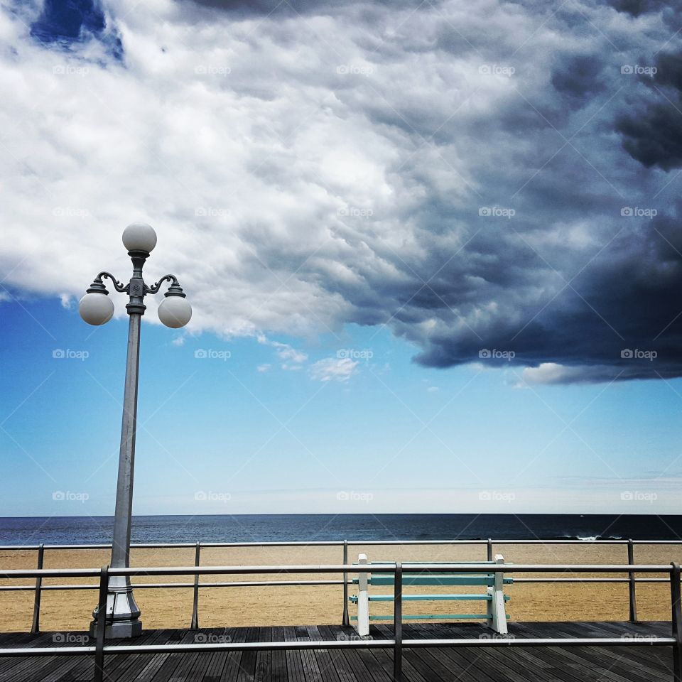 cloudy day at the beach. i thought the clouds looked very eerie