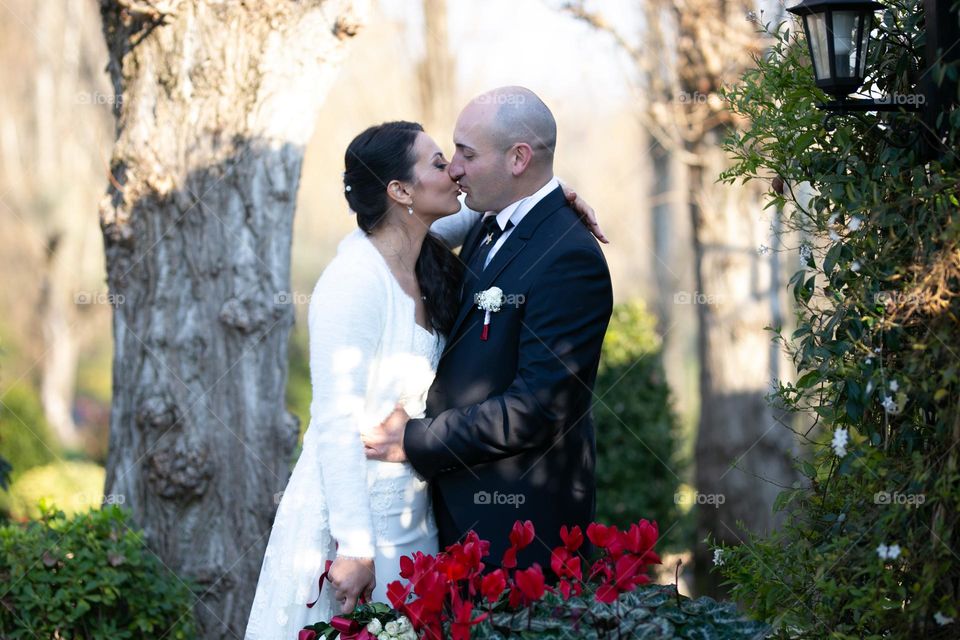 bride and groom kiss