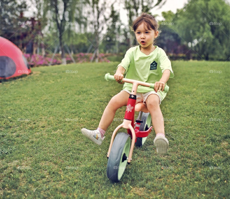 Little Girl Enjoying Her Bike Ride