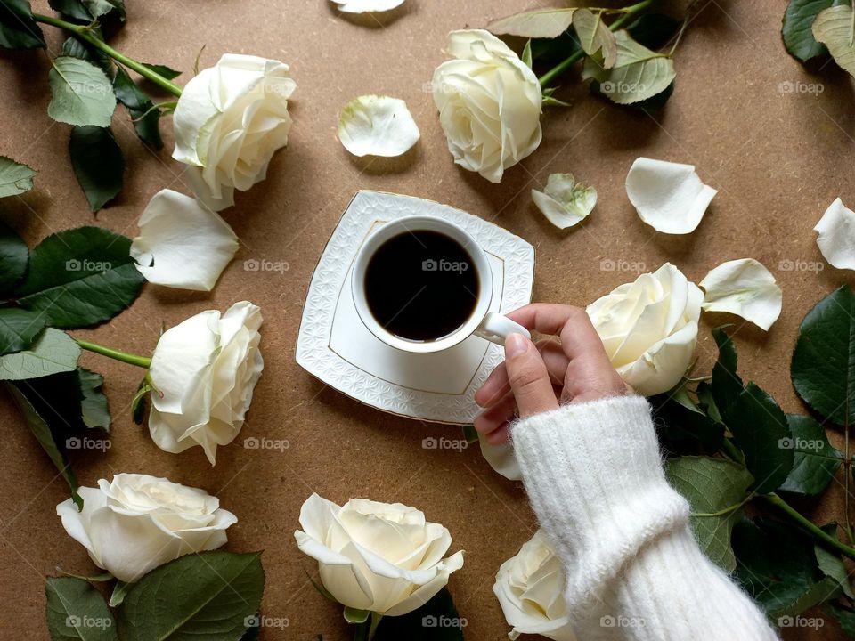 black coffee and white roses.