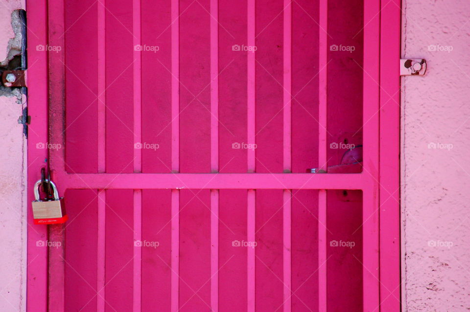 Pink locked door