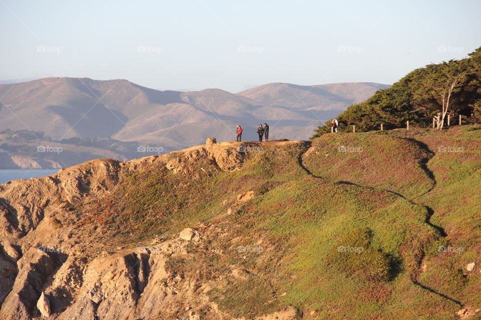 Mountain landscape with tourists 