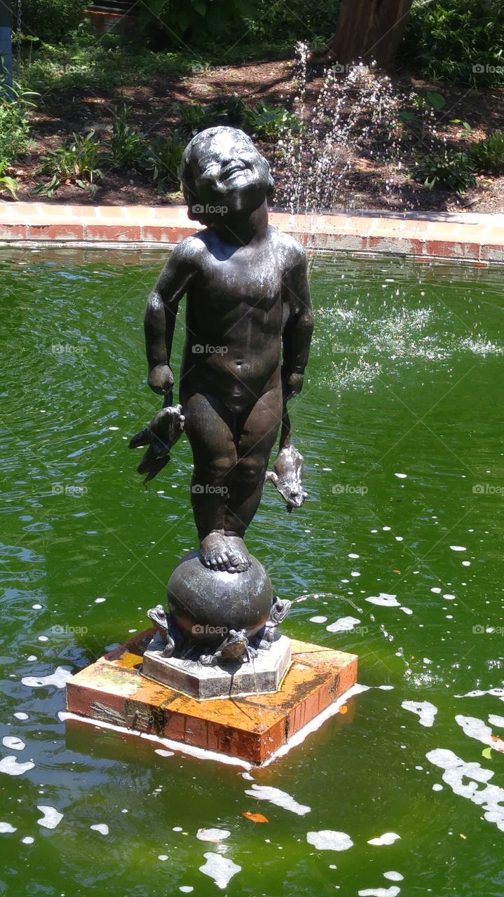This sculpture of a boy playing with frogs and laughing was my favorite at Brookgreen Gardens in South Carolina