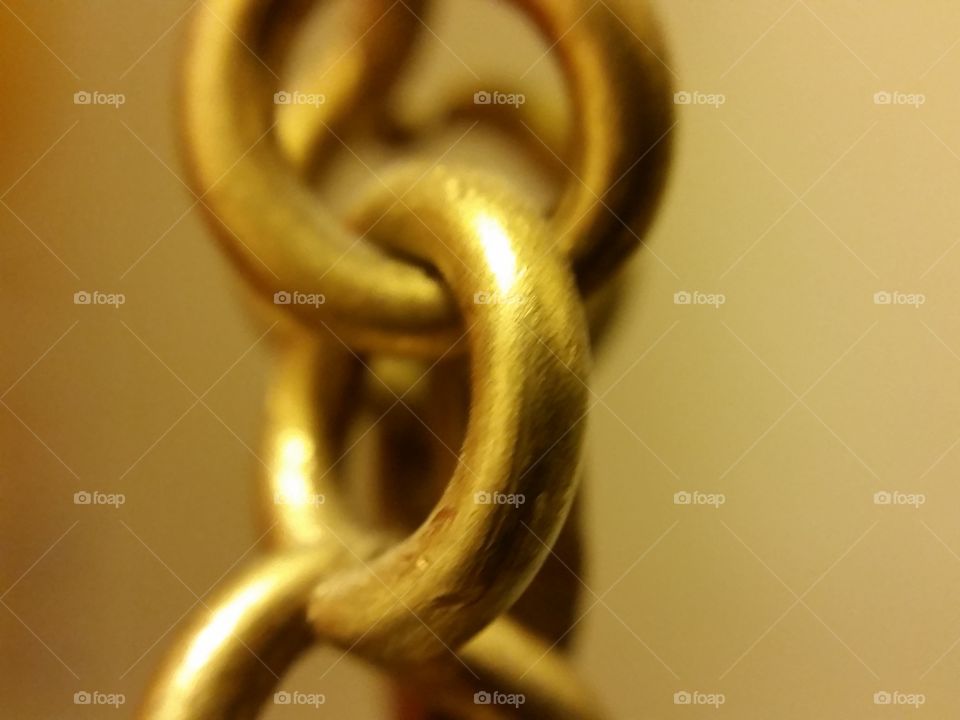 Brass chains. Shiny brass chains