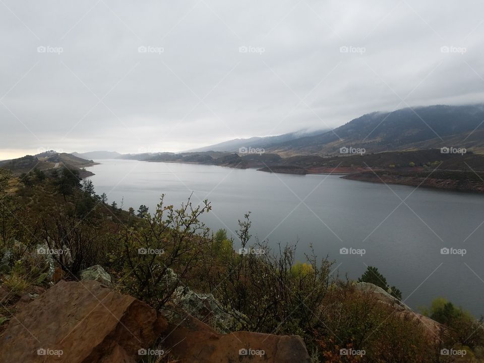 Gorgeous view of Horsetooth Reservoir on a cool and misty Autumn day.
