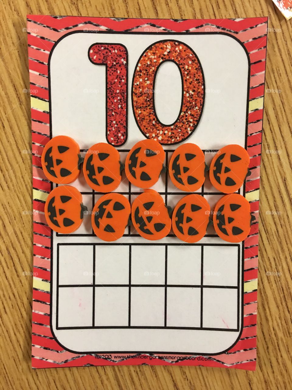 Ten frame with pumpkin eraser counters