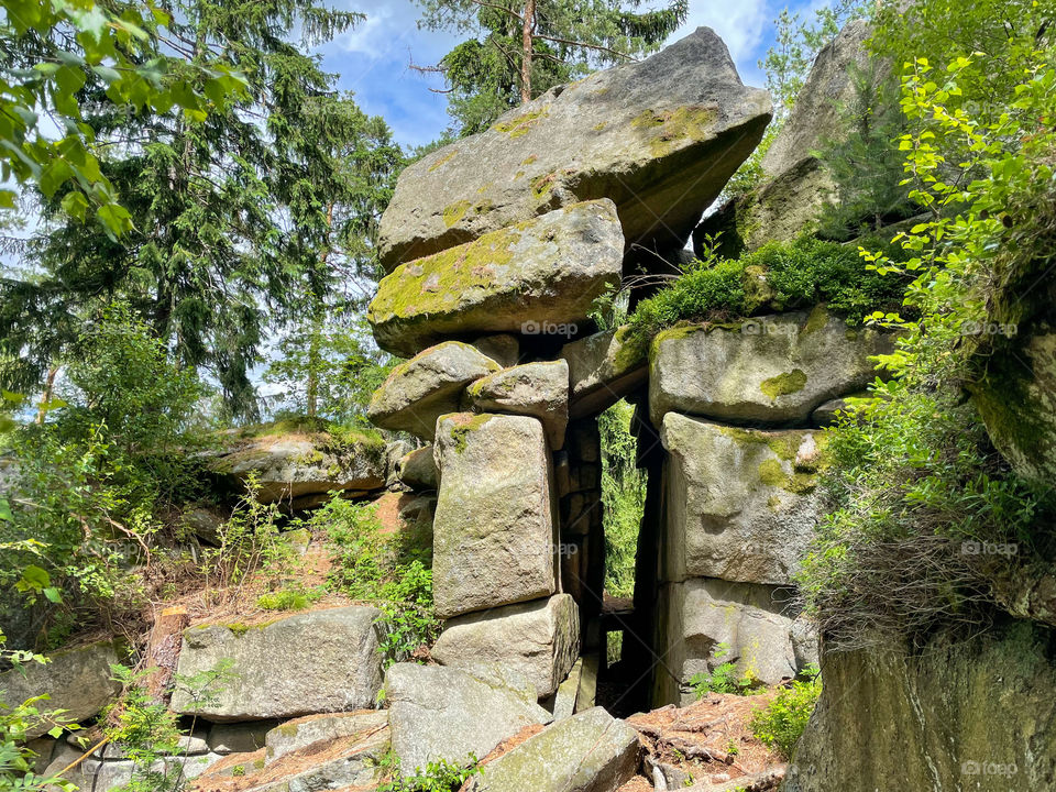 Small rock "window" in the forest.
