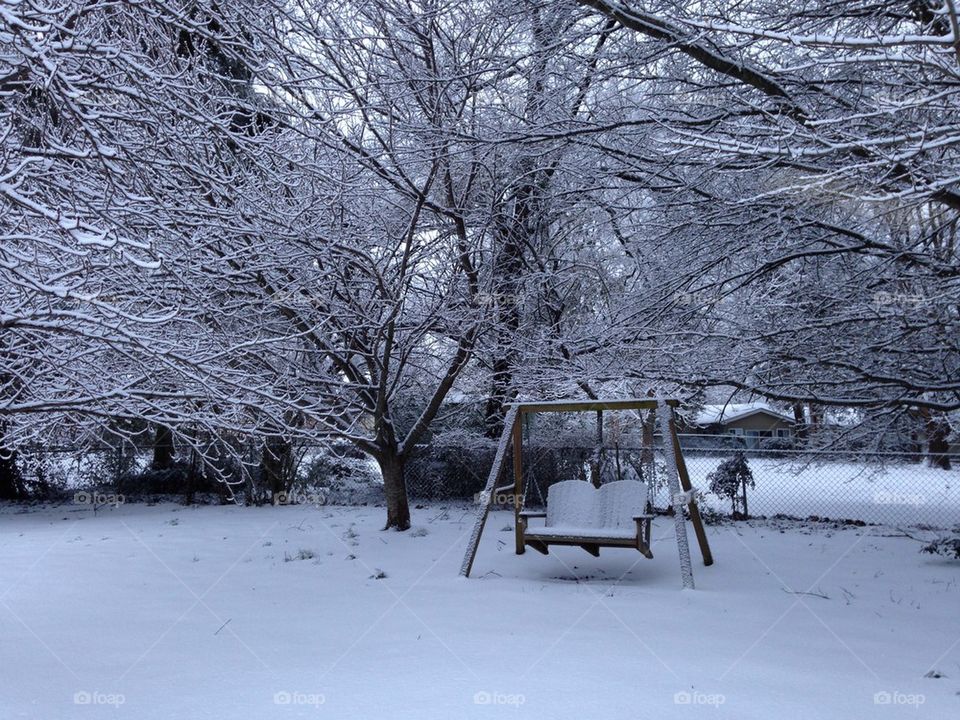 Backyard swing in the snow