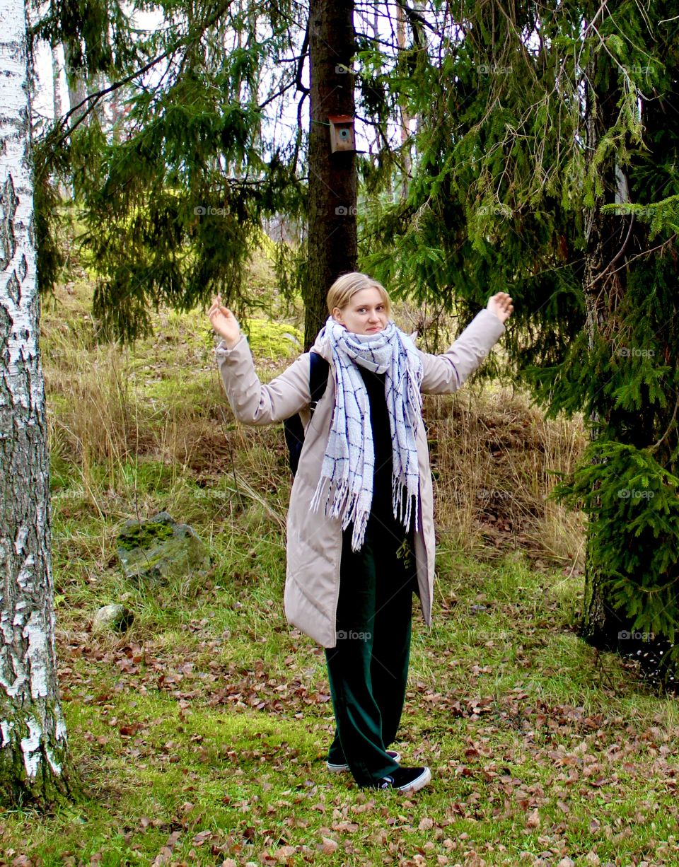Girl wirh scarf in autumn forest