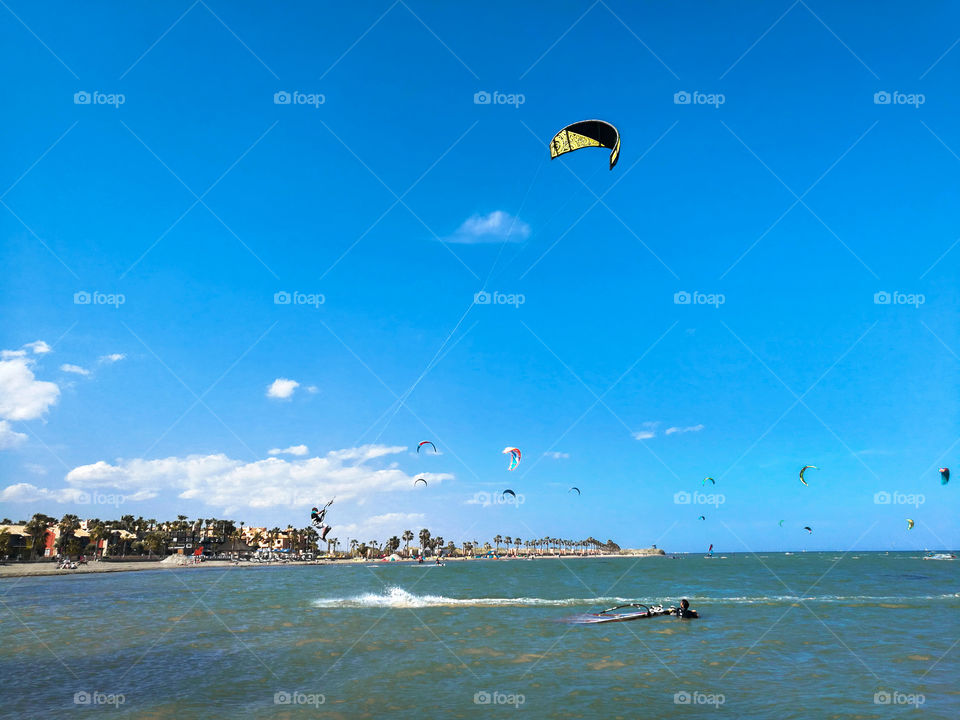 Sportman practicing kitesurf in Spain