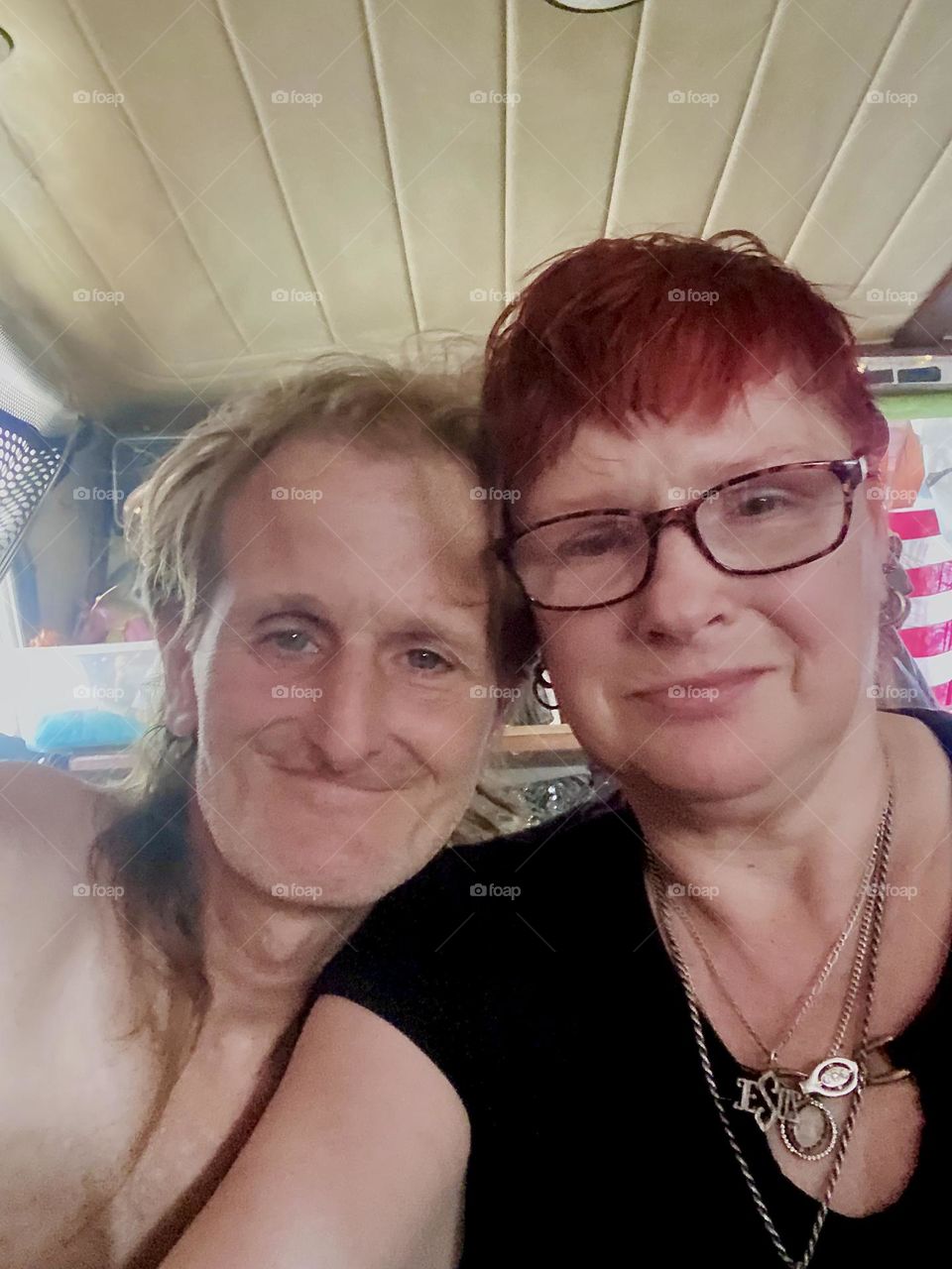 Partners for 16 years and sailors aboard “Salvation”, a “28 ft 1969 Luhrs” cabin cruiser for several years I, “Petra Schiller” a.k.a. “Maxine Firefox” and “Timothy Trespas” are snapping a selfie on a lovely summer day in 2023. Hypnotic Productions