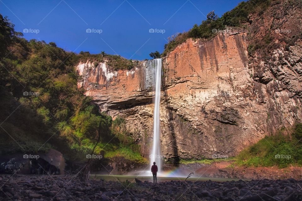 Contemplating the waterfall