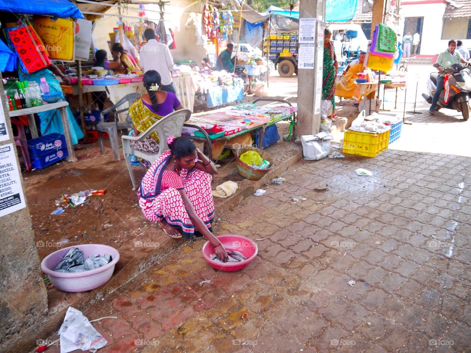 Woman selling fishes 