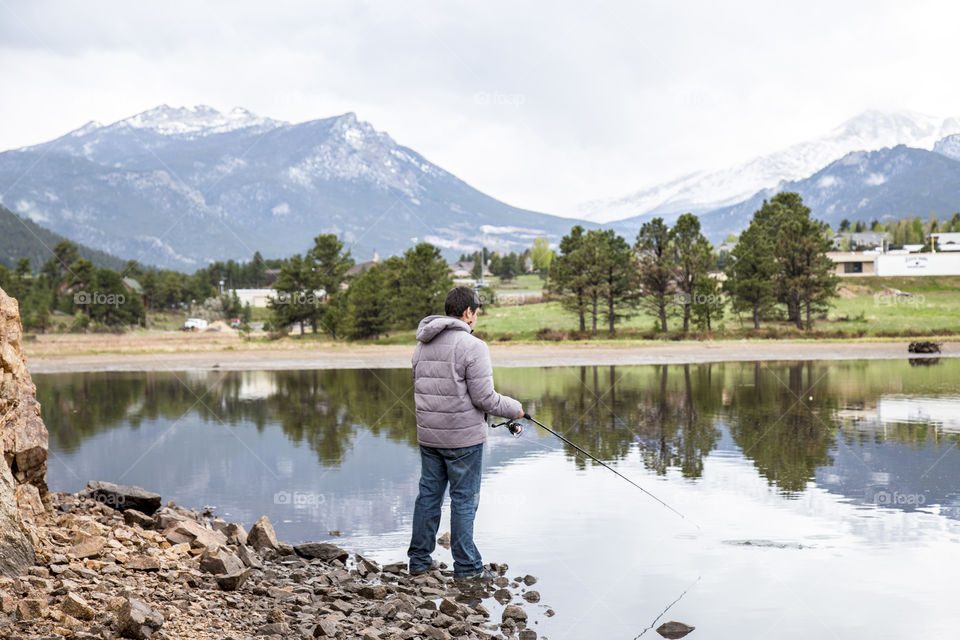 Man fishing at the lake 