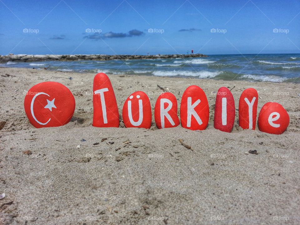 Turkey, Türkiye with national flag on stones 