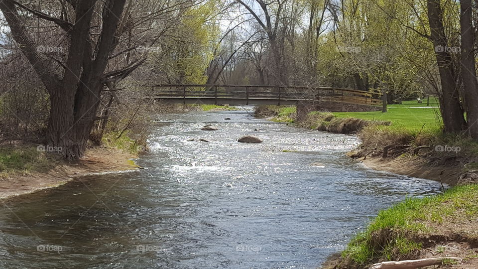 Beautiful Rapid Creek as seen behind Storybook Island in Rapid City South Dakota.