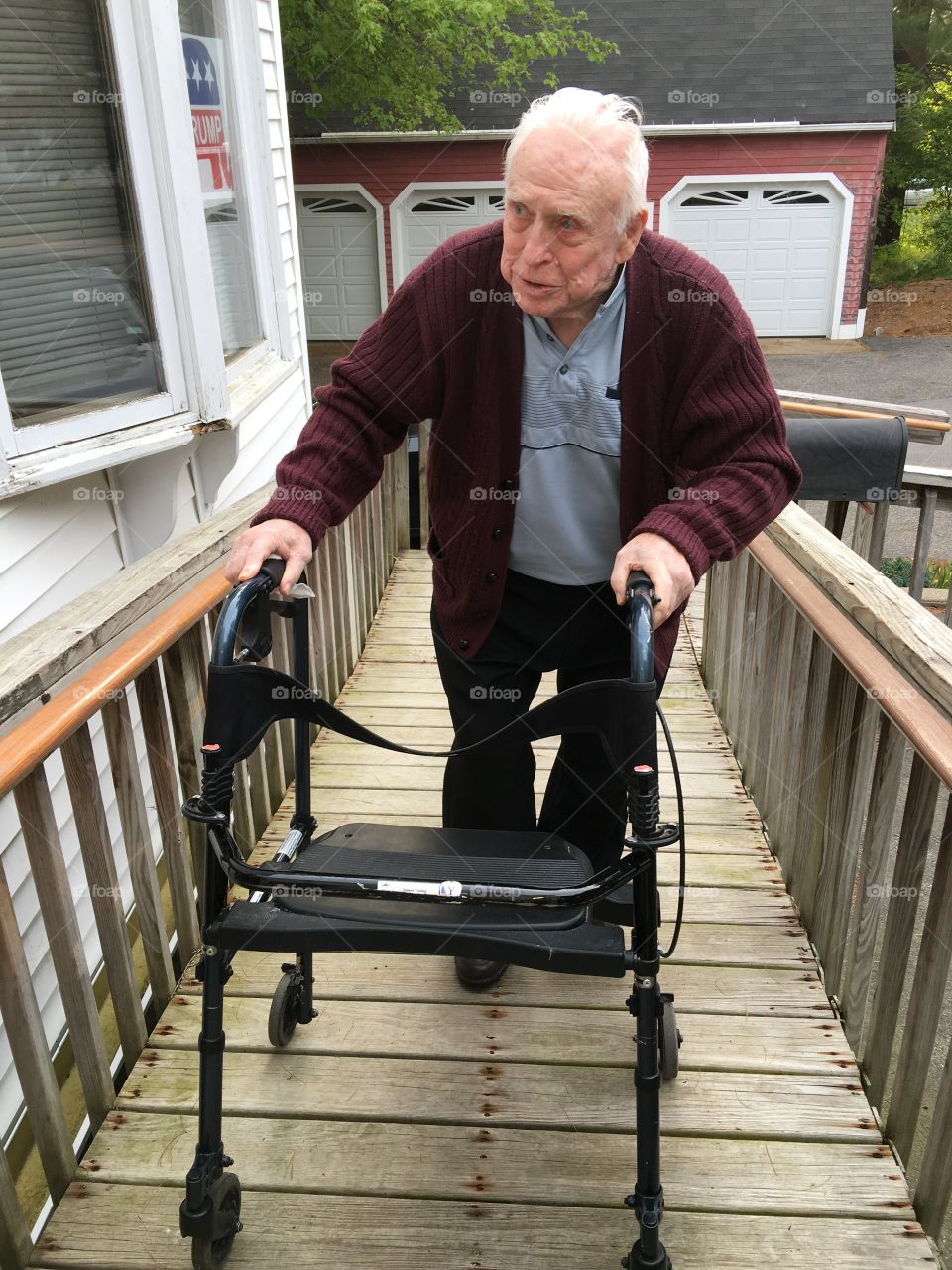 Senior man walking with walker