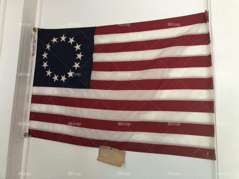 Picture of American flag with 13 stars on it