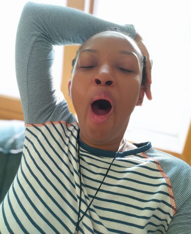 Girl yawning
