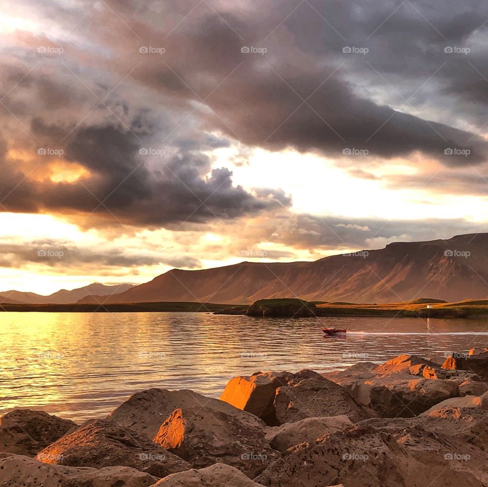 End to a beautiful day as the sunset a luck few enjoy skipping on the golden rays of sun on the water.