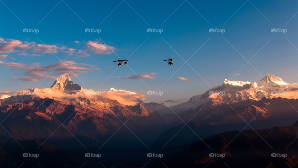 Flying Ultralight aircraft around the Mount Fishtail and Mount Annapurna range at Pokhara, Nepal