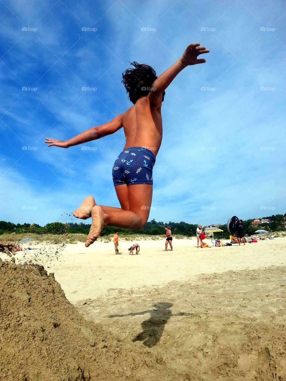 jump. jump in the beach