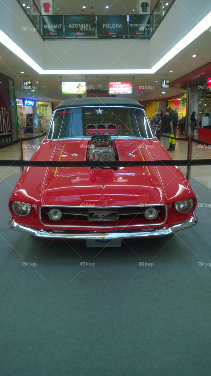 red mustang with big V8 motor