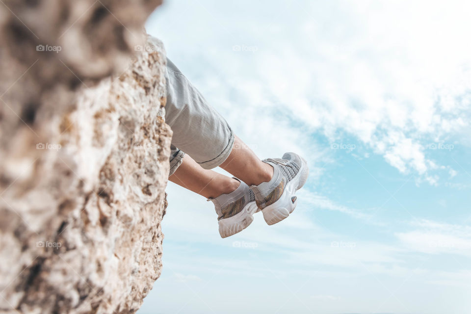 woman legs in the sky, bottom view