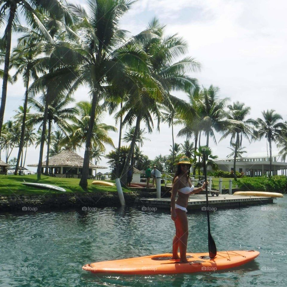 Enjoy the cryatal water of Fiji Islands and try the stand up paddle boarding