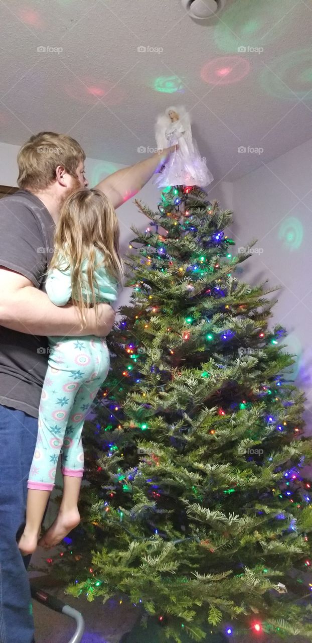 An angel atop the tree