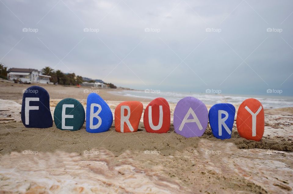 February on colourful stones