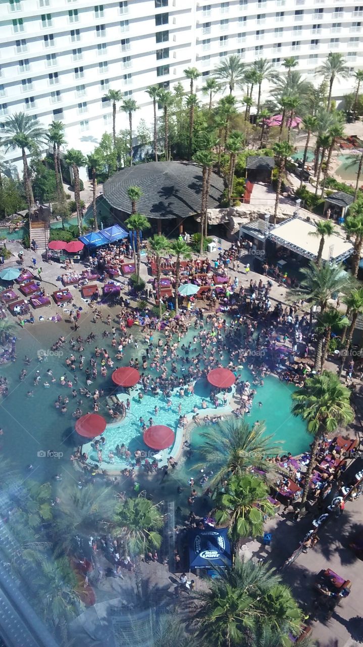 Looking down at a huge pool party in Las Vegas
