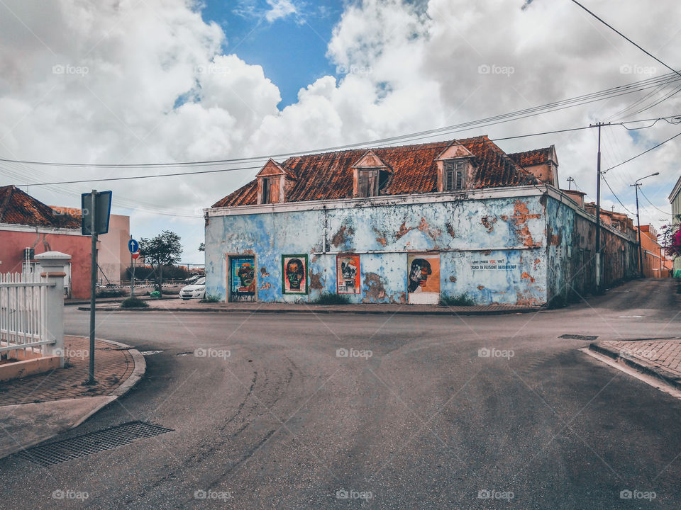 local art, abandoned building with paintings on the wall