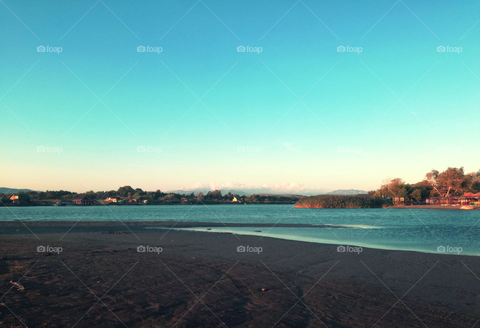 amazing place. river and sea. confluence. sandy beach