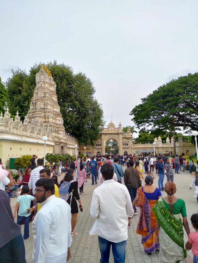 Visitors crowd at the front gate of Mysore Palace