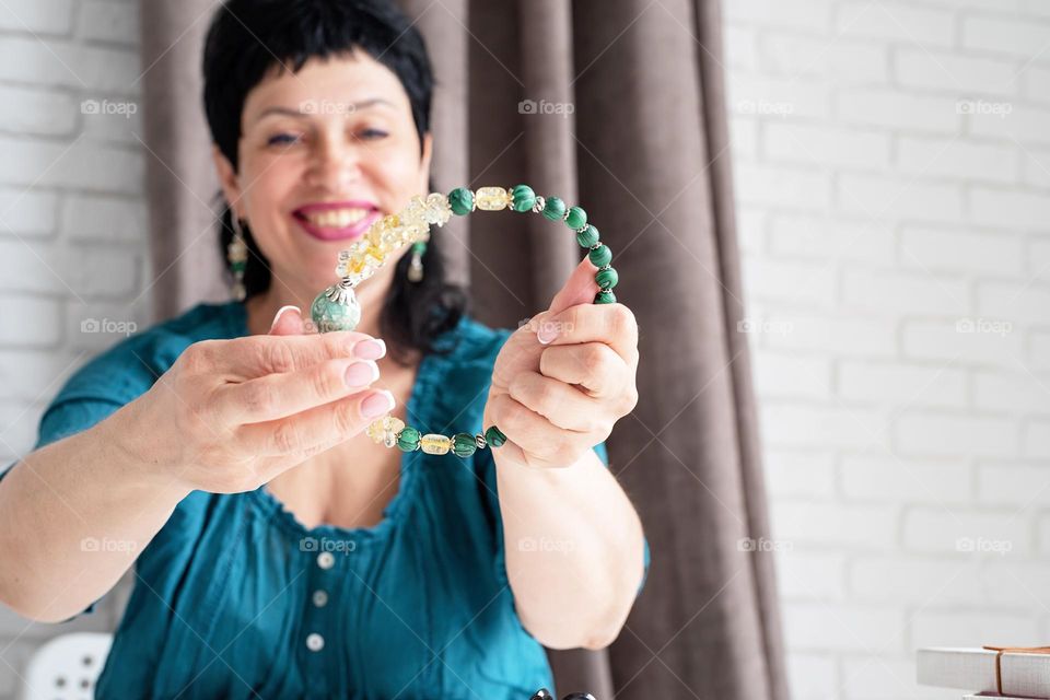 Beautiful Middle Age Woman with jewelry